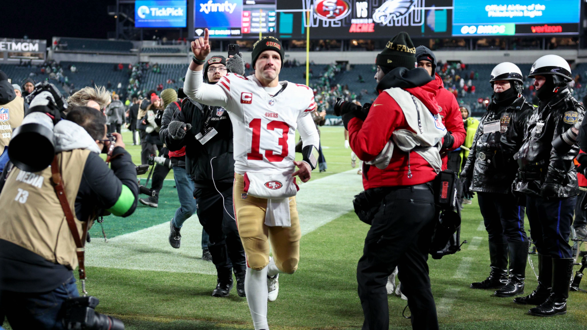 Brock Purdy #13 of the San Francisco 49ers celebrates after his team's 23-19 win against the Philadelphia Eagles in the NFC Wild Card Playoff game at Lincoln Financial Field on January 11, 2026 in Philadelphia, Pennsylvania.