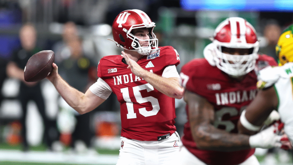 QB Fernando Mendoza #15 of the Indiana Hoosiers attempts a pass during the Indiana Hoosiers versus Oregon Ducks College Football Playoff Semifinal at the Chick-Fil-A Peach Bowl on January 9, 2026 at Mercedes-Benz Stadium in Atlanta, GA.