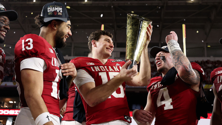 Fernando Mendoza #15 of the Indiana Hoosiers celebrates with the College Football Playoff National Championship Trophy after defeating Miami Hurricanes 27-21 in the 2026 College Football Playoff National Championship at Hard Rock Stadium on January 19, 2026 in Miami Gardens, Florida.