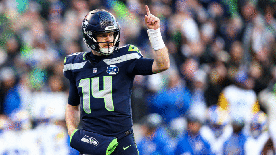 Sam Darnold #14 of the Seattle Seahawks reacts after a touchdown during the first quarter of the NFC Championship NFL football game against the Los Angeles Rams, at Lumen Field on January 25, 2026 in Seattle, WA.