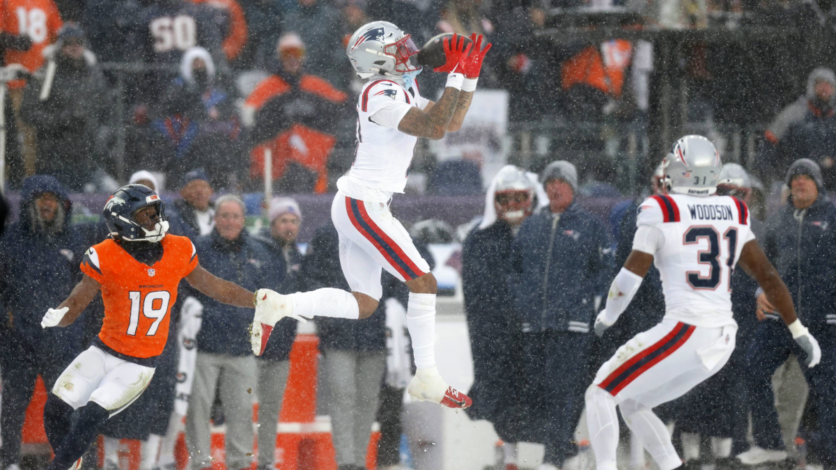 Christian Gonzalez #0 of the New England Patriots intercepts a pass from Jarrett Stidham #8 of the Denver Broncos (not pictured) intended for Marvin Mims Jr. #19 during the fourth quarter in the AFC Championship Playoff game at Empower Field At Mile High on January 25, 2026 in Denver, Colorado.