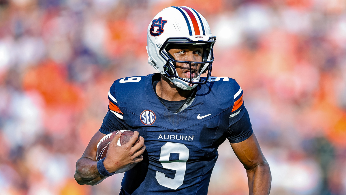Deuce Knight #9 of the Auburn Tigers runs the ball during the first half against the Mercer Bears at Jordan Hare Stadium on November 22, 2025 in Auburn, Alabama.
