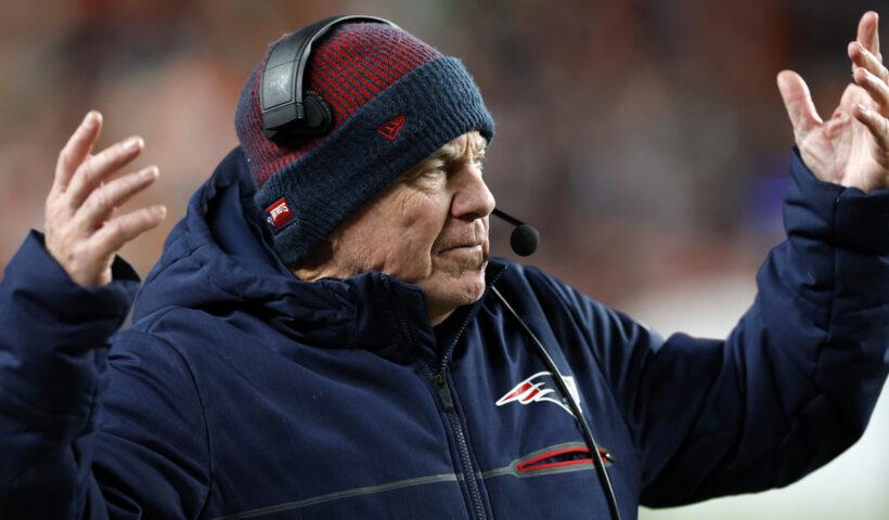 New England Patriots head coach Bill Belichick throws his hands up in the second half. The Patriots beat the Denver Broncos, 26-23.