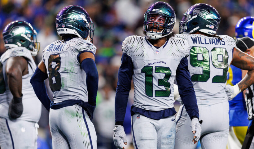 Ernest Jones IV #13 of the Seattle Seahawks stands on the field during the first half of the NFL football game against the Los Angeles Rams at Lumen Field on December 18, 2025 in Seattle, Washington.