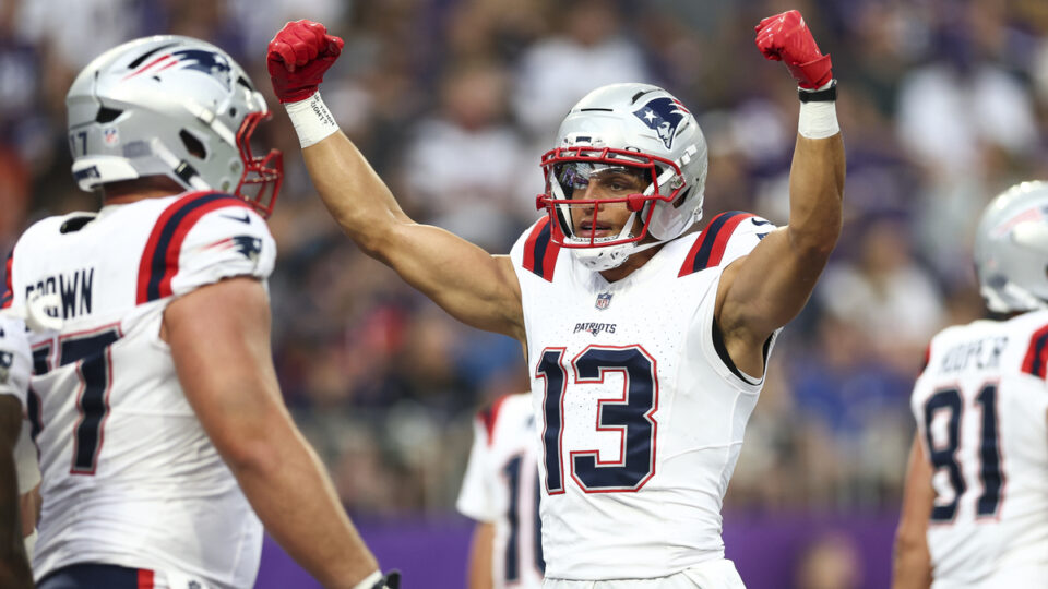 Mack Hollins #13 of the New England Patriots celebrates after a play during the first quarter of an NFL preseason football game against the Minnesota Vikings at U.S. Bank Stadium on August 16, 2025 in Minneapolis, Minnesota.