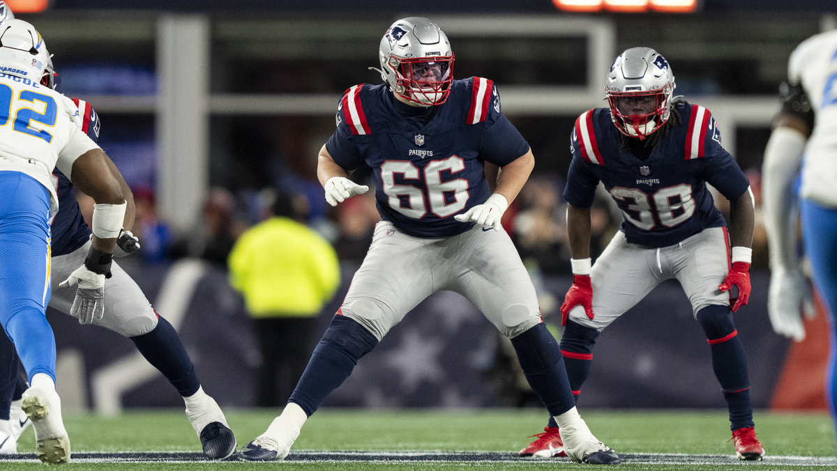 Will Campbell #66 of the New England Patriots defends during an NFL wild card playoff game against the Los Angeles Chargers at Gillette Stadium on January 11, 2026 in Foxborough, Massachusetts.