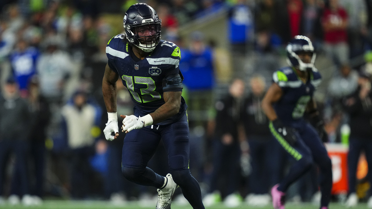 Ernest Jones IV #13 of the Seattle Seahawks defends in coverage during an NFL football game against the Houston Texans at Lumen Field on October 20, 2025 in Seattle, Washington.