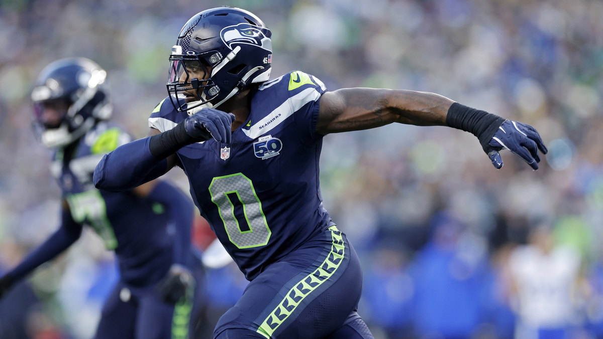 DeMarcus Lawrence #0 of the Seattle Seahawks pursues a play on defense during the NFC Championship game against the Los Angeles Rams on January 25, 2026 at Lumen Field in Seattle, Washington.