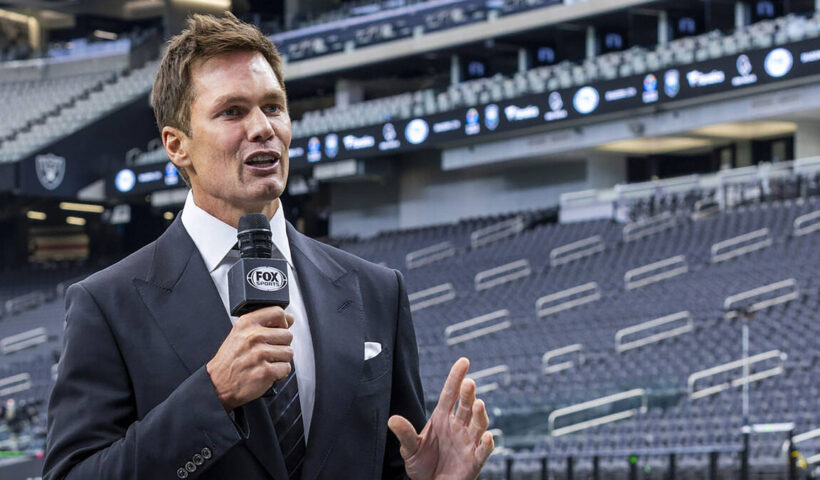 Raiders minority owner and Fox football analyst Tom Brady talks at Allegiant Stadium on Monday, Sept. 15, 2025, in Las Vegas.