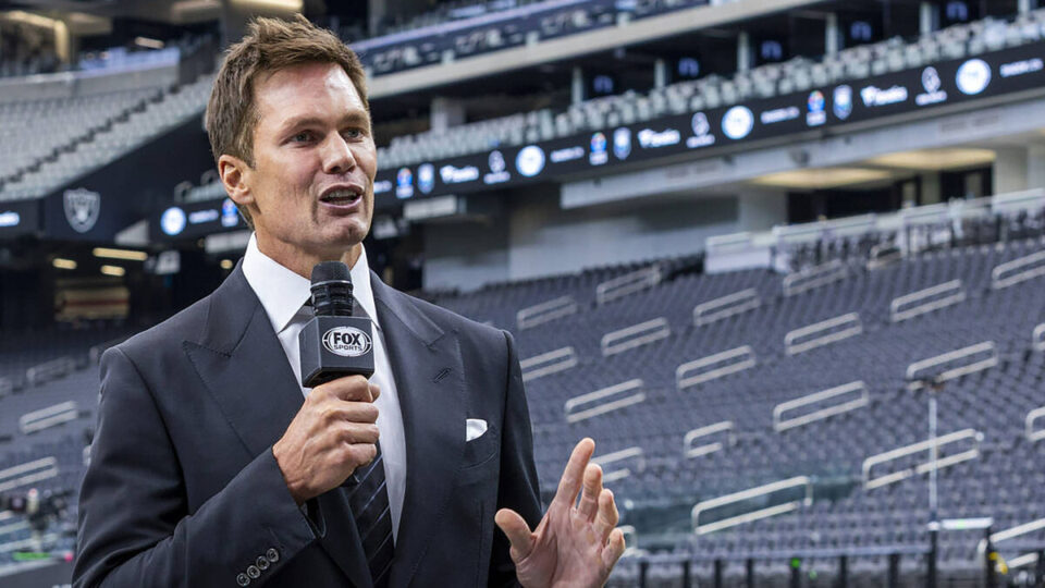 Raiders minority owner and Fox football analyst Tom Brady talks at Allegiant Stadium on Monday, Sept. 15, 2025, in Las Vegas.