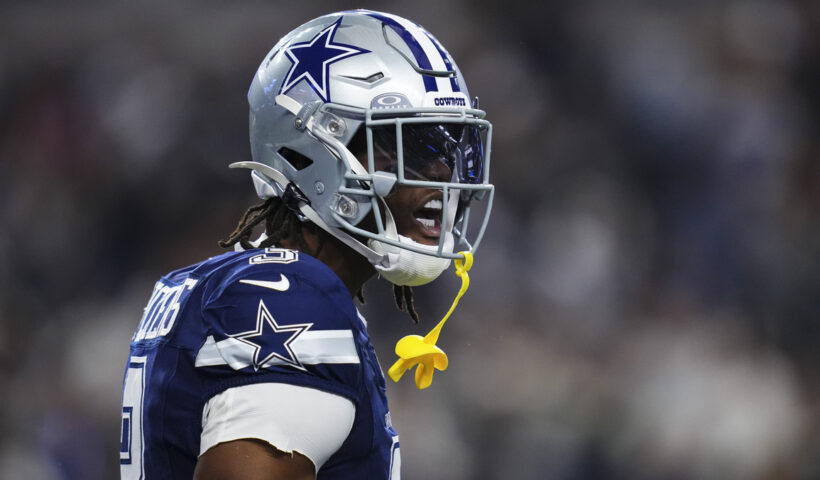 George Pickens #3 of the Dallas Cowboys celebrates during an NFL football game against the Los Angeles Chargers at AT&T Stadium on December 21, 2025 in Arlington, Texas.