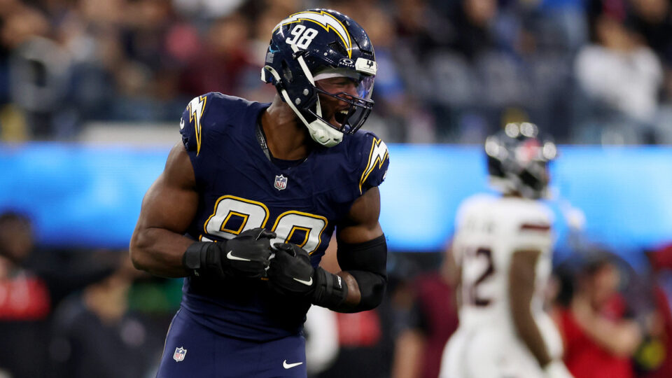 Odafe Oweh #98 of the Los Angeles Chargers reacts after a sack during the fourth quarter of the game against the Houston Texans at SoFi Stadium on December 27, 2025 in Inglewood, California.