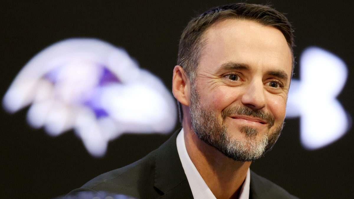 New Baltimore Ravens head coach Jesse Minter is introduced during a news conference at Under Armour Performance Center Baltimore Ravens on January 29, 2026 in Owings Mills, Maryland.