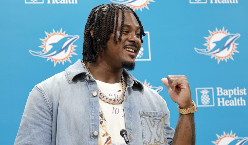 Quarterback Malik Willis speaks after signing to play with the Miami Dolphins at Baptist Health Training Complex on Thursday, March 12, 2026, in Miami Gardens, Florida.