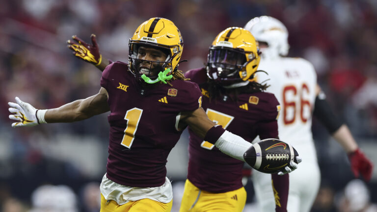 Keith Abney II #1 of the Arizona State Sun Devils celebrates after a turnover during the second half of the Big 12 Championship game against the Iowa State Cyclones at AT&T Stadium on December 7, 2024 in Arlington, Texas.