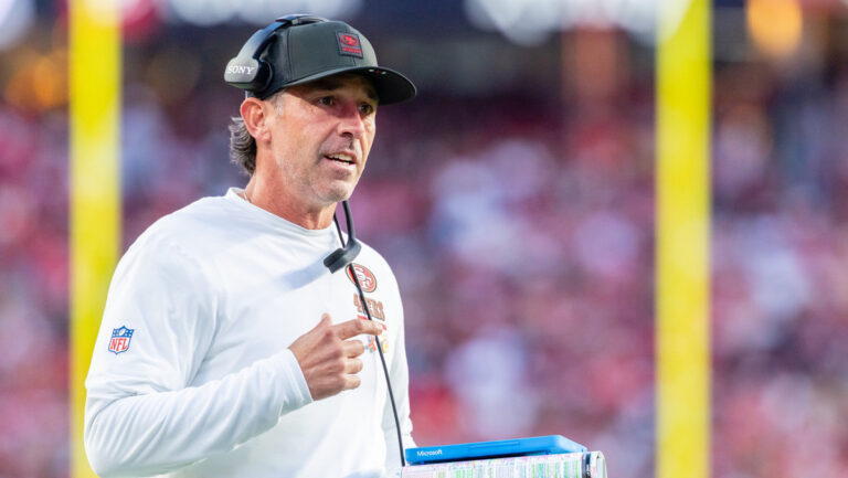 San Francisco 49ers head coach Kyle Shanahan interacts with a referee during a NFL game against the Atlanta Falcons on October 19, 2025 at Levi's Stadium in Santa Clara, California.