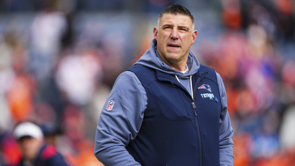 New England Patriots head coach Mike Vrabel looks on from the field during warmups prior to the AFC Championship NFL football game against the Denver Broncos at Empower Field At Mile High on January 25, 2026 in Denver, Colorado.