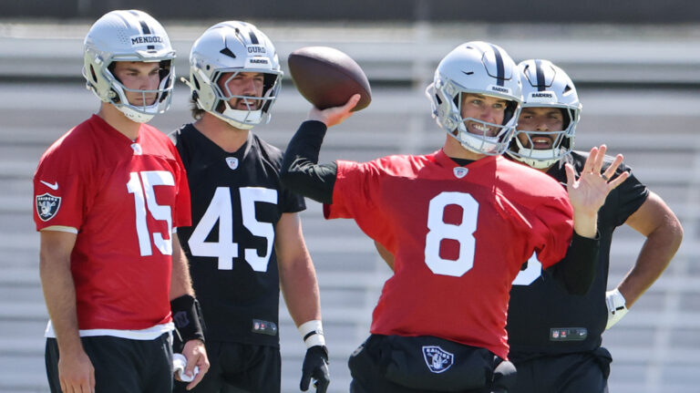 Fernando Mendoza #15, Patrick Gurd #45, Kirk Cousins #8 and Connor Heyward #34 of the Las Vegas Raiders practice during an OTA offseason workout at the Las Vegas Raiders Headquarters/Intermountain Health Performance Center on May 20, 2026 in Henderson, Nevada.