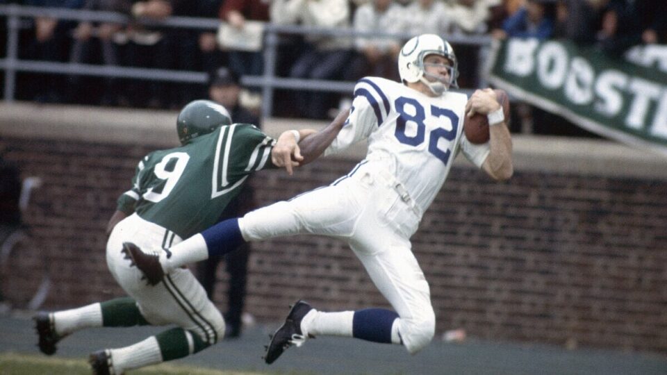 Wide Receiver Raymond Berry #82 of the Baltimore Colts catches a pass over a Philadelphia Eagles defender during a circa 1960's NFL football game at Franklin Field in Philadelphia, Pennsylvania. Berry played for the Colts from 1955-67.
