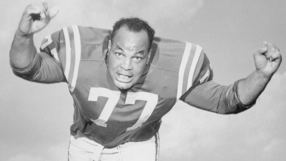 Jim Parker of the Baltimore Colts in tackling position.