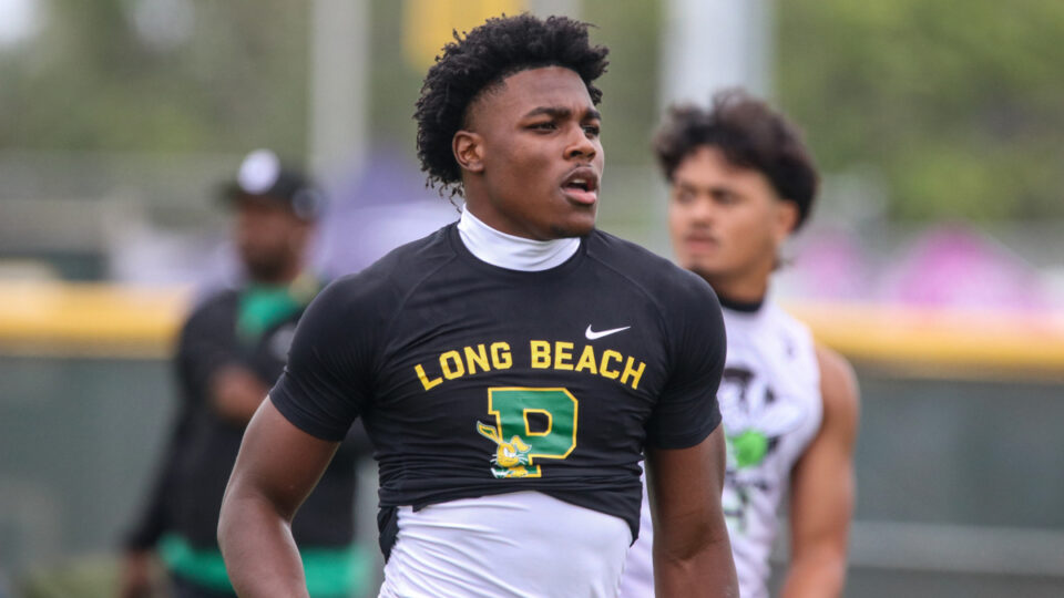 Long Beach Poly two-way athlete JuJu Johnson runs back after a play at the Edison Battle at the Beach on May 11, 2026 in Huntington Beach, California.