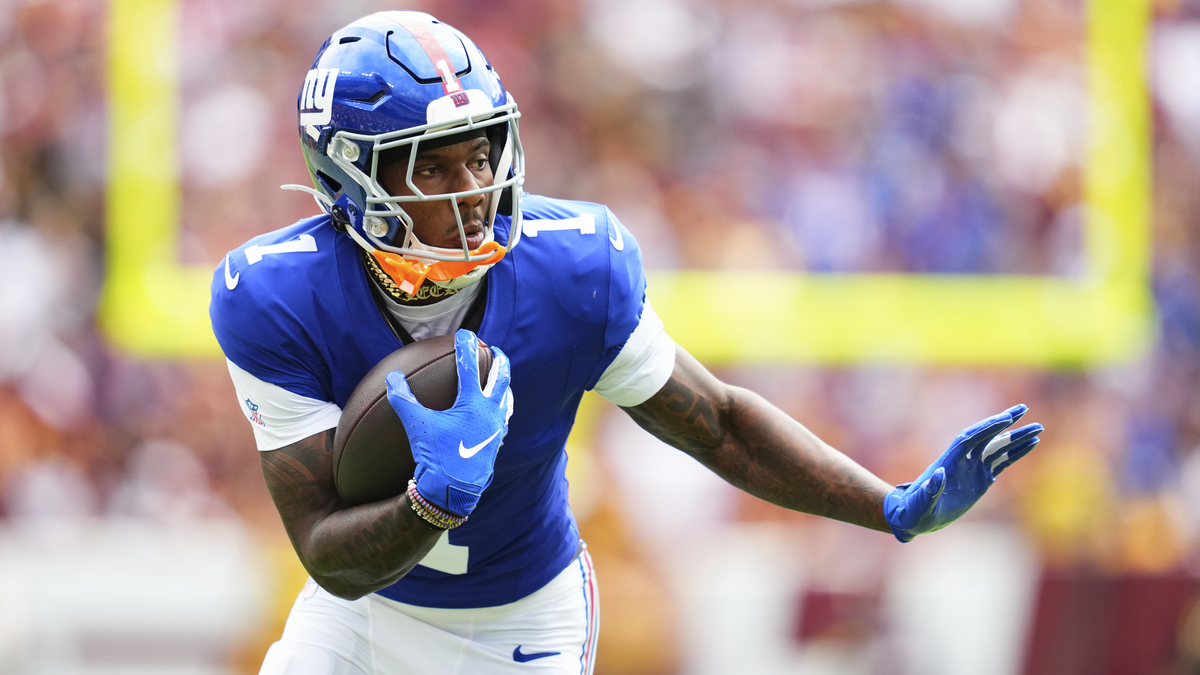 Malik Nabers #1 of the New York Giants runs with the ball against the Washington Commanders during an NFL football game at Northwest Stadium on September 7, 2025 in Landover, Maryland.
