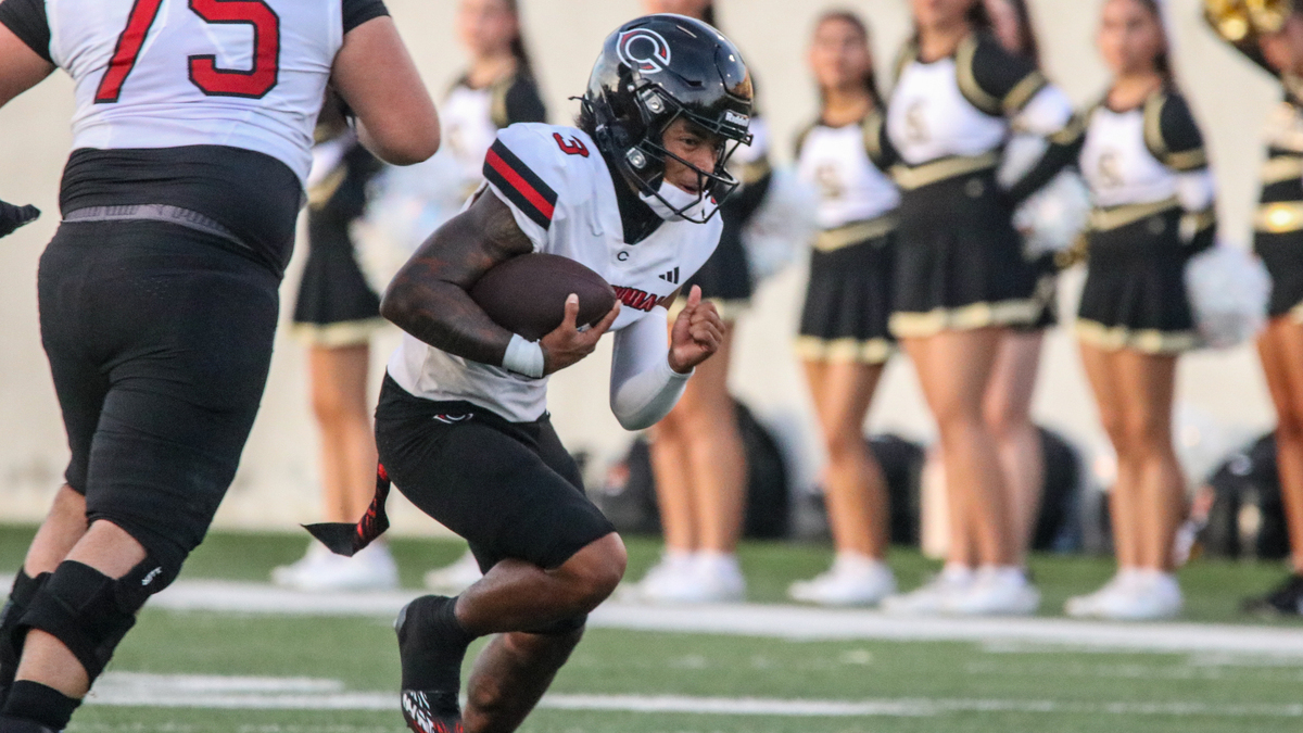 Corona Centennial quarterback Jaden Jefferson runs the ball during a matchup between Centennial and Servite on Aug. 20, 2026 at Orange Coast College in Costa Mesa, California.