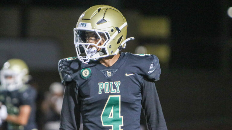 Long Beach Poly cornerback Donte Wright looks on before a play in a game against Long Beach Milikan on Oct. 11, 2025 at Veterans Stadium in Long Beach, California.