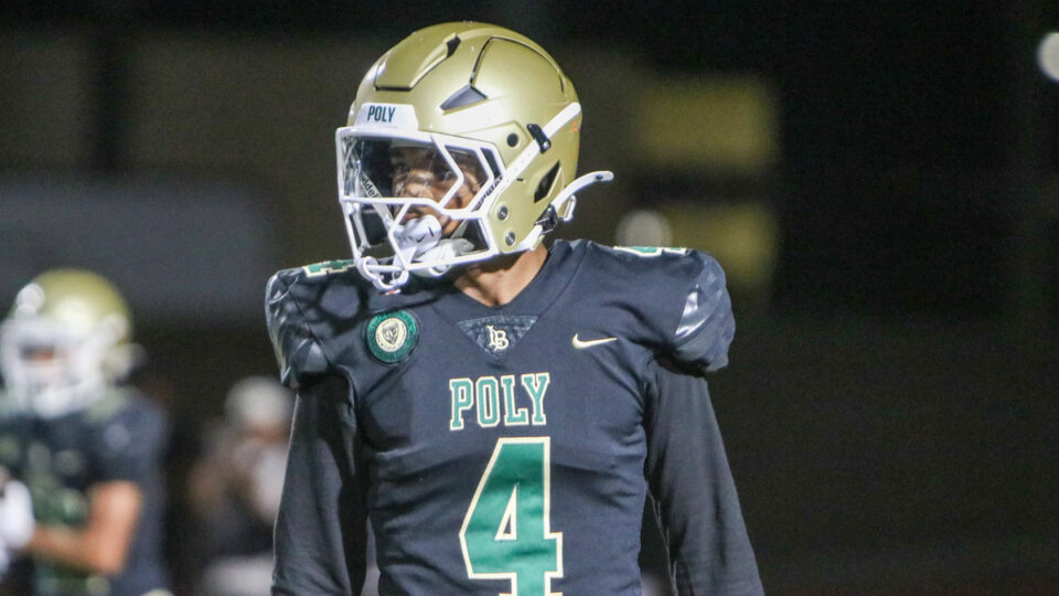 Long Beach Poly cornerback Donte Wright looks on before a play in a game against Long Beach Milikan on Oct. 11, 2025 at Veterans Stadium in Long Beach, California.