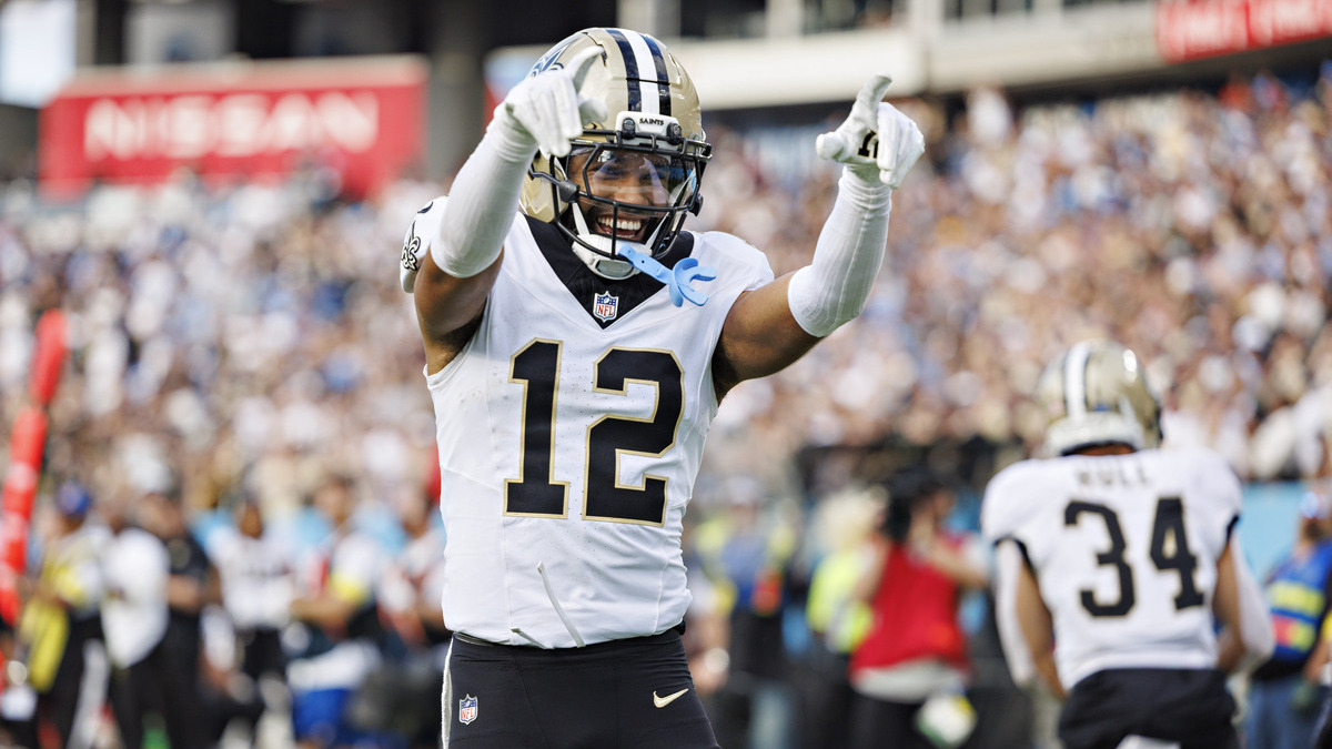 Chris Olave #12 of the New Orleans Saints celebrates after a touchdown during a game against the Tennessee Titans at Nissan Stadium on December 28, 2025 in Nashville, Tennessee. The Saints defeated the Titans 34-26.