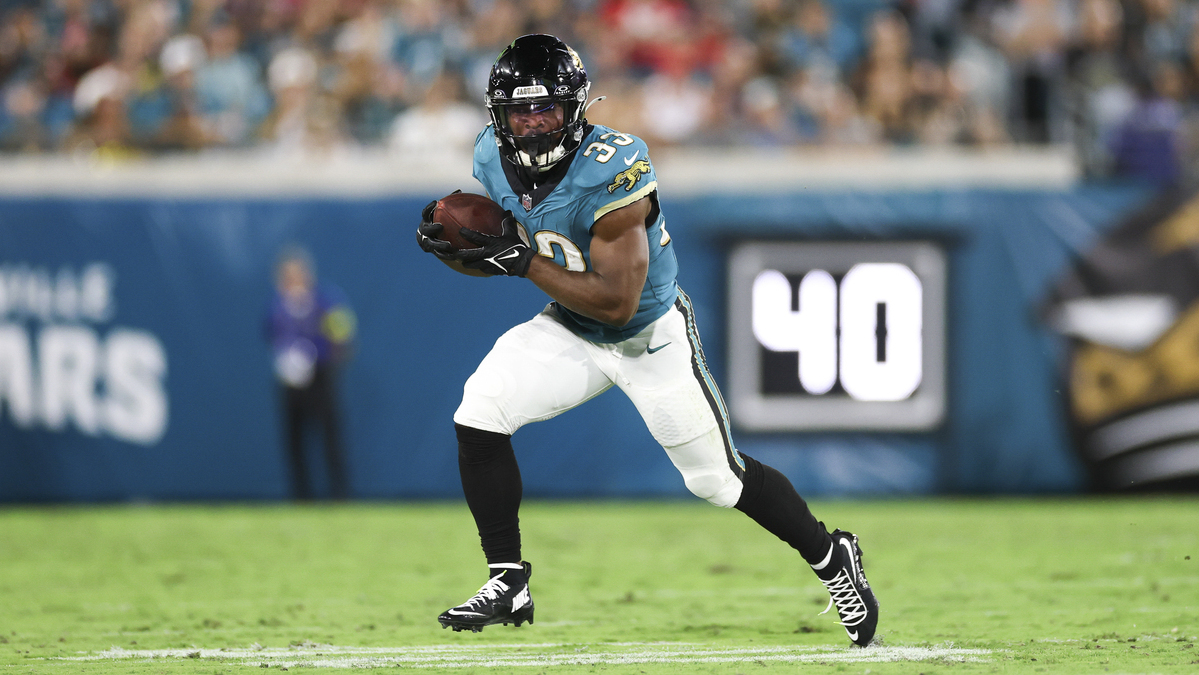 Bhayshul Tuten #33 of the Jacksonville Jaguars runs the ball during an NFL football game against the Kansas City Chiefs at Everbank Stadium on October 6, 2025 in Jacksonville, Florida.