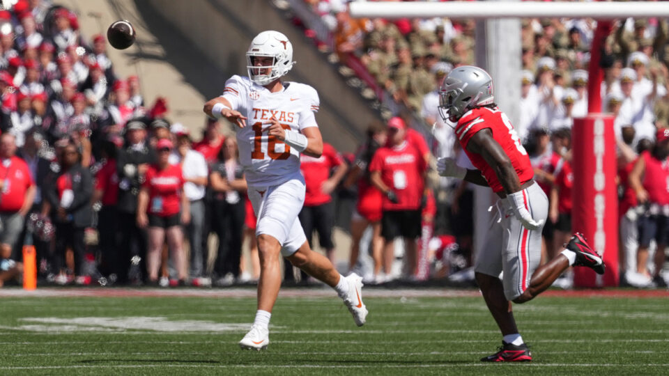 Quarterback Arch Manning #16 of the Texas Longhorns passes the ball during the first quarter against the Ohio State Buckeyes at Ohio Stadium on August 30, 2025 in Columbus, Ohio.