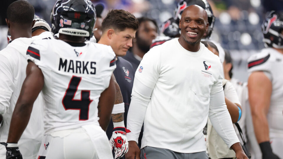 Head Coach DeMeco Ryans of the Houston Texans reacts with Woody Marks #4 during warm ups prior to the game against the Buffalo Bills at NRG Stadium on September 13, 2026 in Houston, Texas.