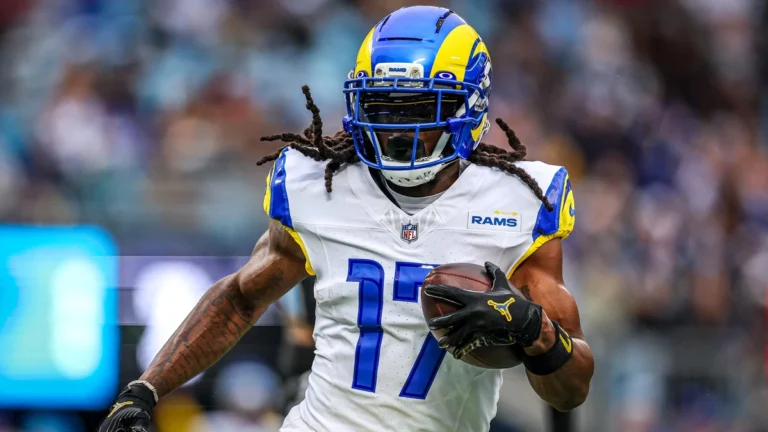 Davante Adams #17 of the Los Angeles Rams runs the ball during the first half of an NFL game against the Carolina Panthers at Bank of America Stadium on November 30, 2025 in Charlotte, North Carolina.