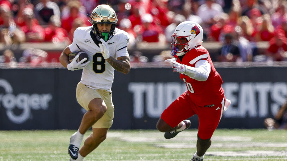 Wake Forest Demon Deacons wide receiver Carlos Hernandez (8) runs up field after the catch during a college football game between the Wake Forest Demon Deacons and the Louisville Cardinals on September 26, 2026 at L&N Federal Credit Union Stadium in Louisville, Kentucky.