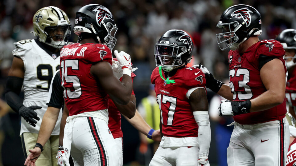 Brian Robinson Jr. #15 of the Atlanta Falcons celebrates with Zachariah Branch #17 and Chris Lindstrom #63 after scoring a touchdown against the New Orleans Saints during the second quarter of the game at Caesars Superdome on October 05, 2026 in New Orleans, Louisiana.