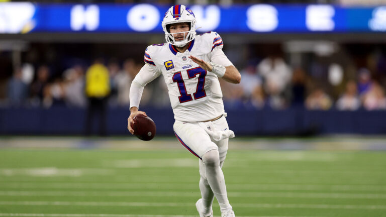 Josh Allen #17 of the Buffalo Bills runs the ball against the Los Angeles Rams during overtime of the game at SoFi Stadium on October 12, 2026 in Inglewood, California.