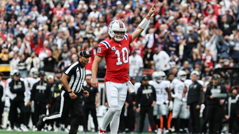 Drake Maye #10 of the New England Patriots celebrates a first-quarter touchdown against the Las Vegas Raiders at Gillette Stadium on October 11, 2026, in Foxborough, Massachusetts.