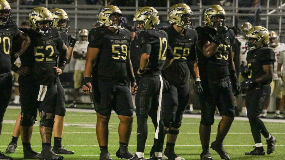St. John Bosco quarterback Koa Malau’ulu (2028) looks to the sideline during a game between St. John Bosco and JSerra at Panish Family Stadium in Bellflower, California on Oct. 2, 2026.