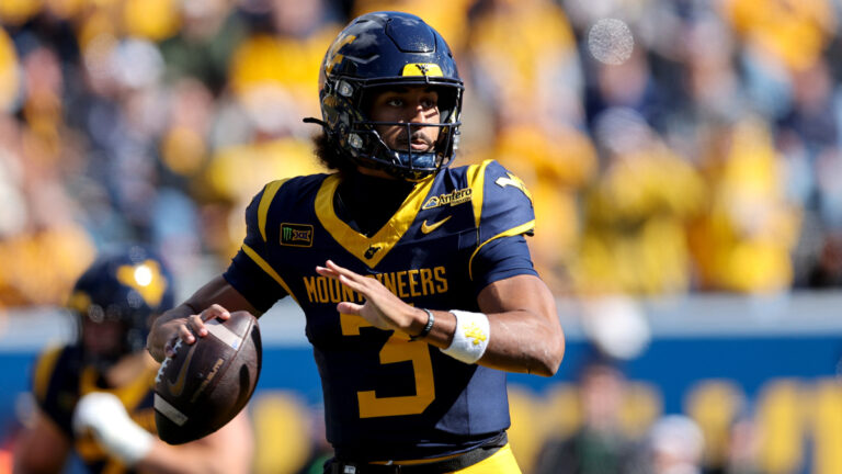 West Virginia Mountaineers quarterback Michael Hawkins Jr. (3) looks to pass during the second quarter of the college football game between the Cincinnati Bearcats the West Virginia Mountaineers on October 17, 2026, at Mountaineer Field at Milan Puskar Stadium in Morgantown, West Virginia.